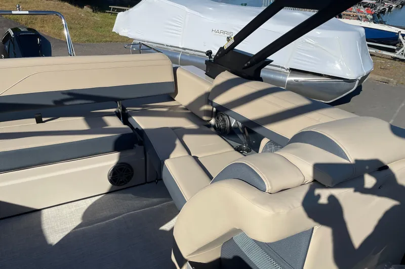 Slide: The Image of 2026 Harris Grand Mariner 230 SL boat interior with beige seating and modern design. - 7