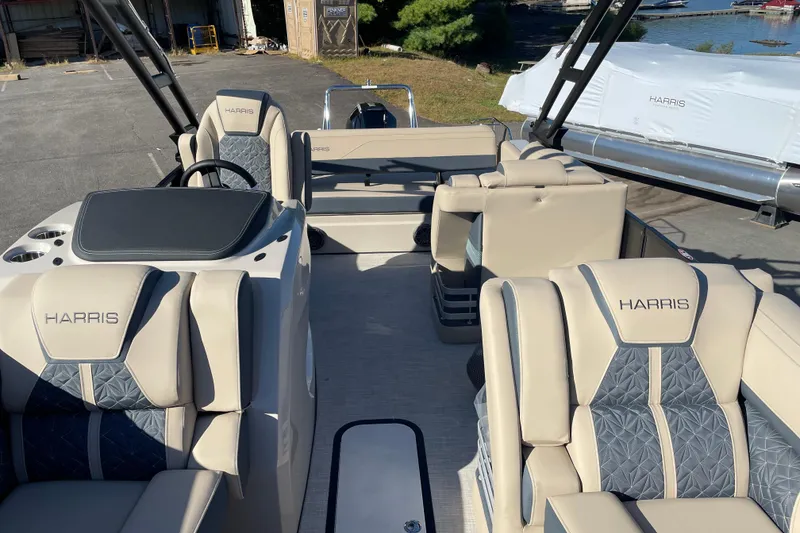 Slide: The Image of 2026 Harris Grand Mariner 230 SL interior with luxurious seating and modern design. - 9