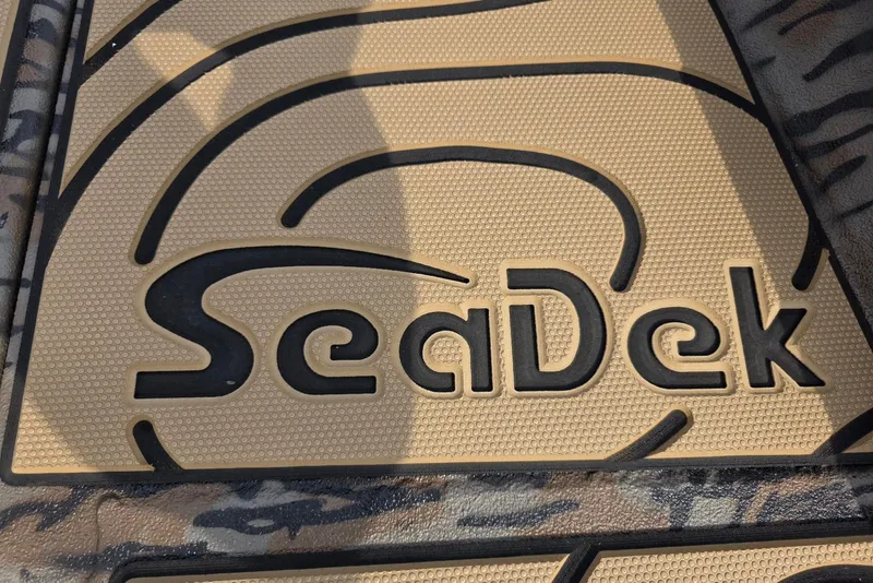 Slide: The Image of SeaDek flooring on 2026 Xpress H22B Bay boat, featuring textured design. - 10