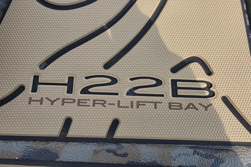 Slide: The Image of 2026 Xpress H22B Hyper-Lift Bay logo on textured surface. - 11