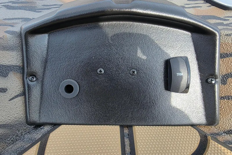 Slide: The Image of Control panel of 2026 Xpress H22B Bay boat with trim switch. - 12