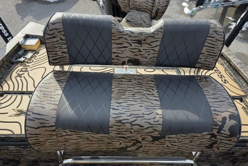 Slide: The Image of 2026 Xpress H22B Bay boat seats with camouflage and diamond-patterned upholstery. - 20