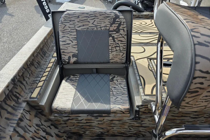 Slide: The Image of Camouflage seating in 2026 Xpress H22B Bay boat, featuring modern design and comfort. - 21