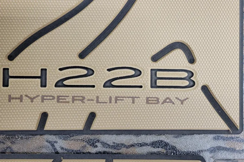 Slide: The Image of 2026 Xpress H22B Bay Hyper-Lift logo on textured surface. - 5