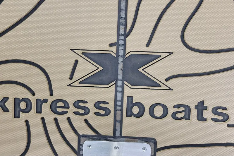 Slide: The Image of 2026 Xpress H22B Bay boat logo with textured design background. - 7