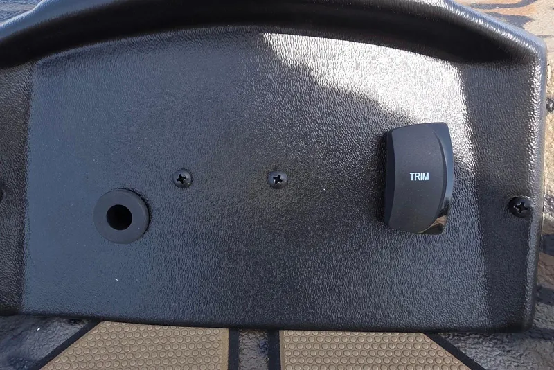 Slide: The Image of Control panel of 2026 Xpress H22B Bay boat with trim switch. - 18