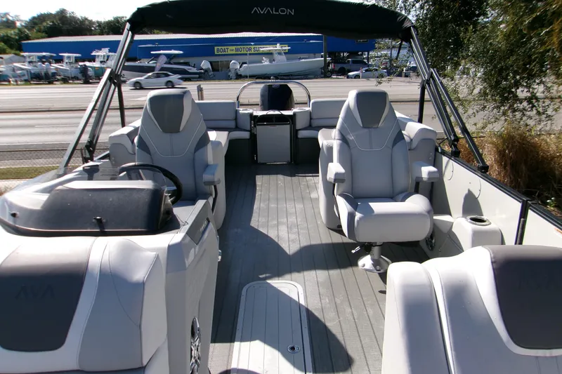 Slide: The Image of 2025 Avalon 2585 Quad Lounger pontoon boat with luxurious seating and modern design. - 10