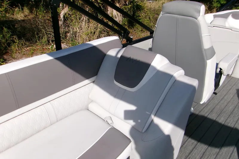 Slide: The Image of 2025 Avalon 2585 Quad Lounger with luxurious gray and white seating, outdoor setting. - 5