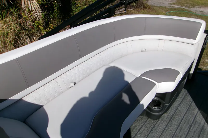 Slide: The Image of 2025 Avalon 2585 Quad Lounger with stylish gray and white seating on a sunny day. - 9