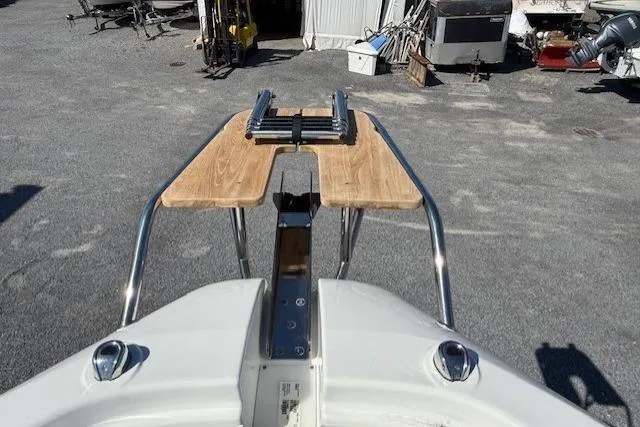 Slide: The Image of 2026 Wellcraft 38 T-Top boat with wooden bow platform and stainless steel rails. - 26