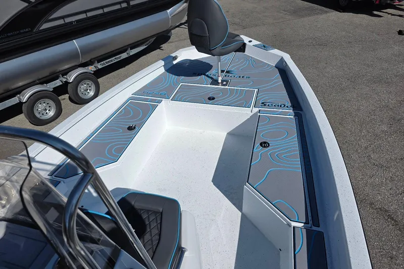 Slide: The Image of 2026 Xpress H22B Bay boat with stylish seating and SeaDek flooring. - 13