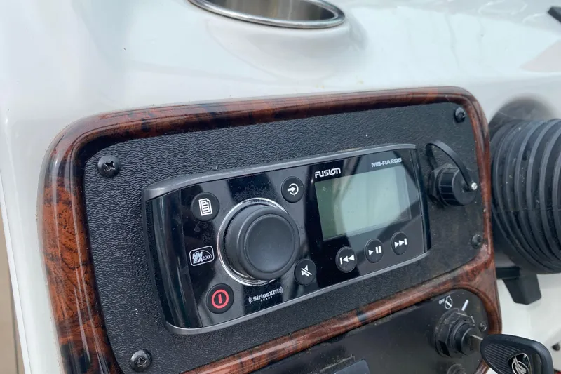 Slide: The Image of Fusion MS-RA205 stereo system on 2015 Crownline 305 SS boat dashboard. - 17