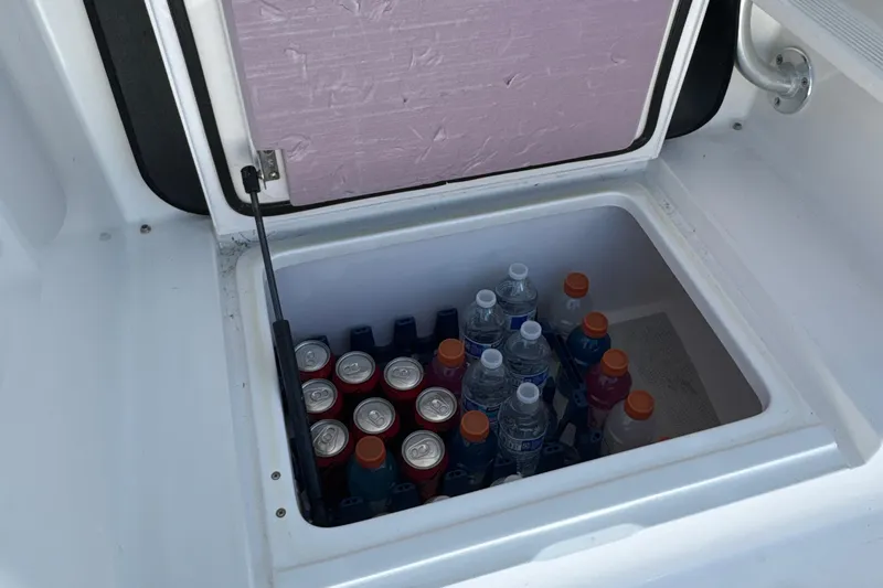Slide: The Image of Cooler on 2006 Viking 56 Convertible boat with drinks and water bottles. - 61