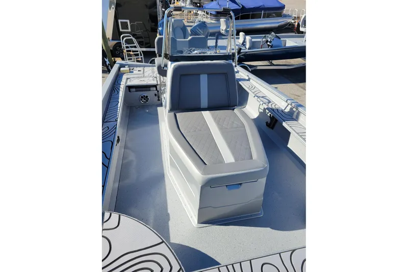 Slide: The Image of 2026 Xpress X23 Bay Lounge boat interior with sleek seating and modern design. - 10