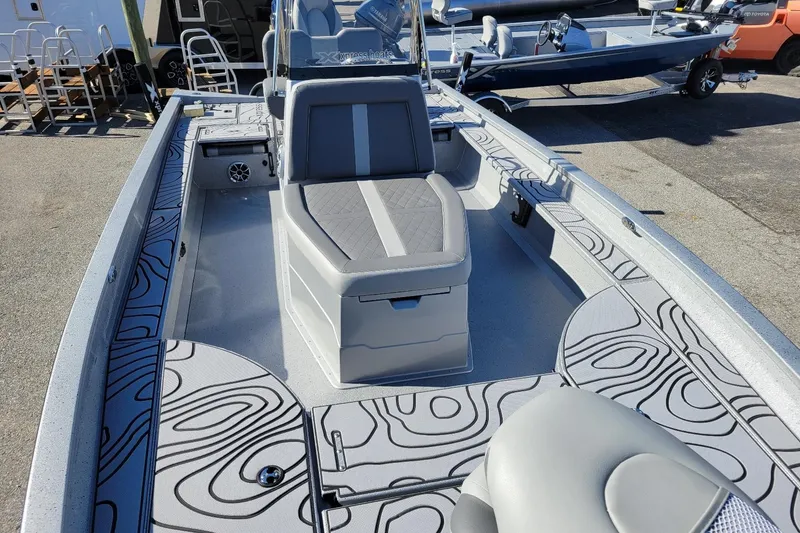 Slide: The Image of 2026 Xpress X23 Bay Lounge boat with stylish seating and modern design. - 9