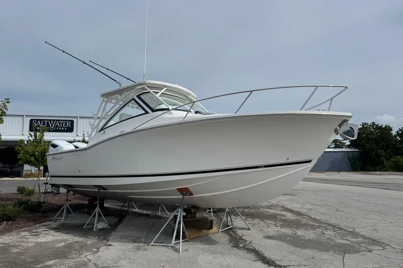 Slide: The Image of 2024 Albemarle 30 Express boat on stands outside Saltywater Outfitters. - 1