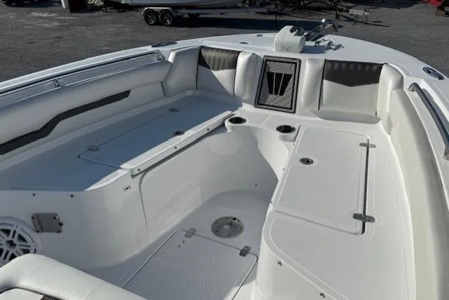 Slide: The Image of 2025 Wellcraft 223 Fisherman boat interior with spacious seating and storage compartments. - 10