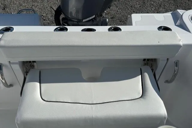 Slide: The Image of 2025 Wellcraft 223 Fisherman boat seating and rod holders, showcasing sleek design and functionality. - 7