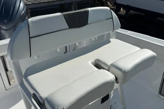 Slide: The Image of 2025 Wellcraft 223 Fisherman boat seat, white upholstery, modern design. - 9