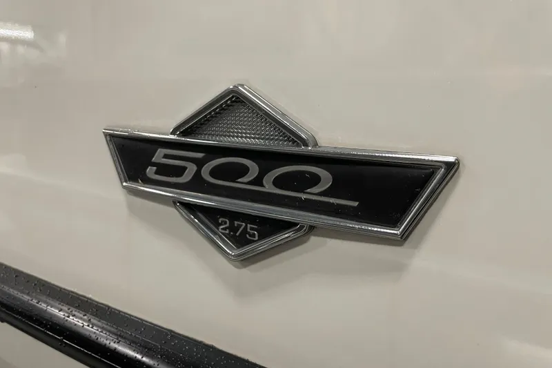 Slide: The Image of 2020 South Bay 523E 2.75 boat floor with storage hatch and textured surface. - 20