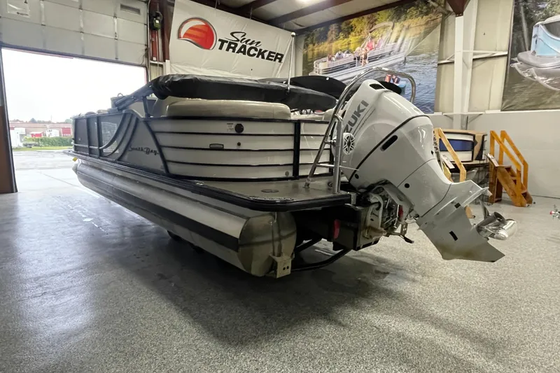 Slide: The Image of South Bay 523E 2.75 boat logo, 2020 model, sleek black lettering on white surface. - 4