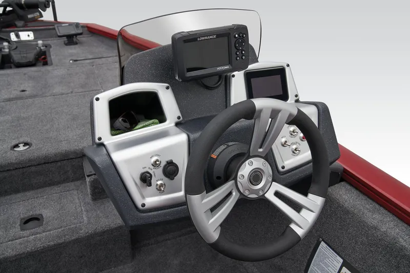 Slide: The Image of Manufacturer Provided Image: 2026 Tracker Pro Team 175 boat interior with gray seating and red accents. - 31