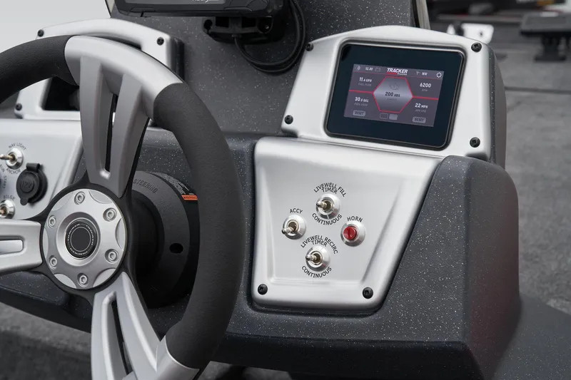 Slide: The Image of Manufacturer Provided Image: 2026 Tracker Pro Team 175 boat dashboard with steering wheel and electronic displays. - 37