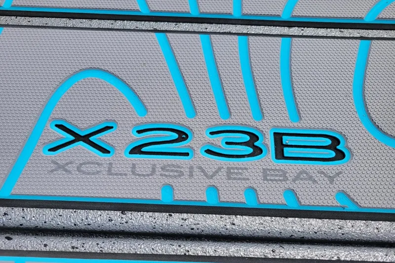 Slide: The Image of Xpress X23 Bay Lounge 2026 model logo with blue accents on textured surface. - 8