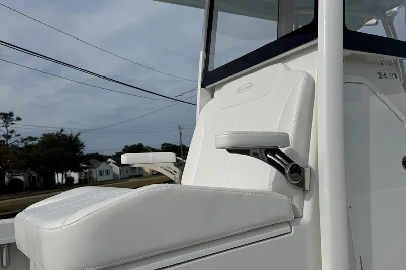 Slide: The Image of White seat on 2025 Pair Customs 24 Center Console MV boat, showcasing sleek design. - 3
