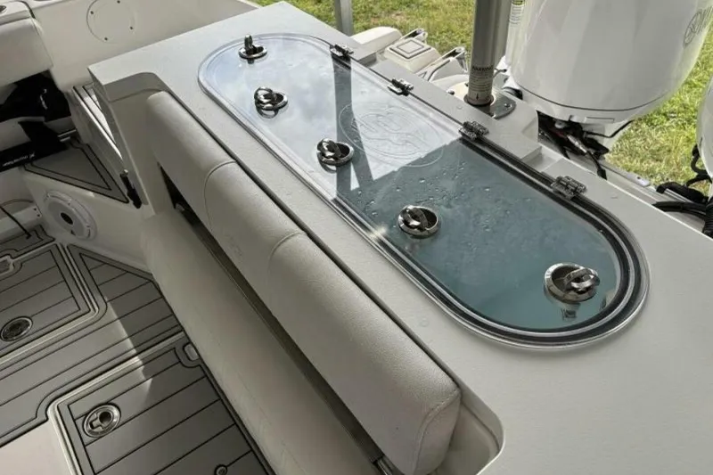 Slide: The Image of 2021 Sea Fox 288 Commander boat interior with livewell and seating area. - 12