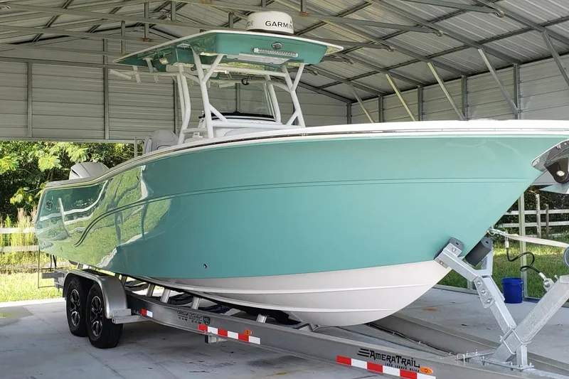 Slide: The Image of 2021 Sea Fox 288 Commander boat on trailer in covered storage. - 2