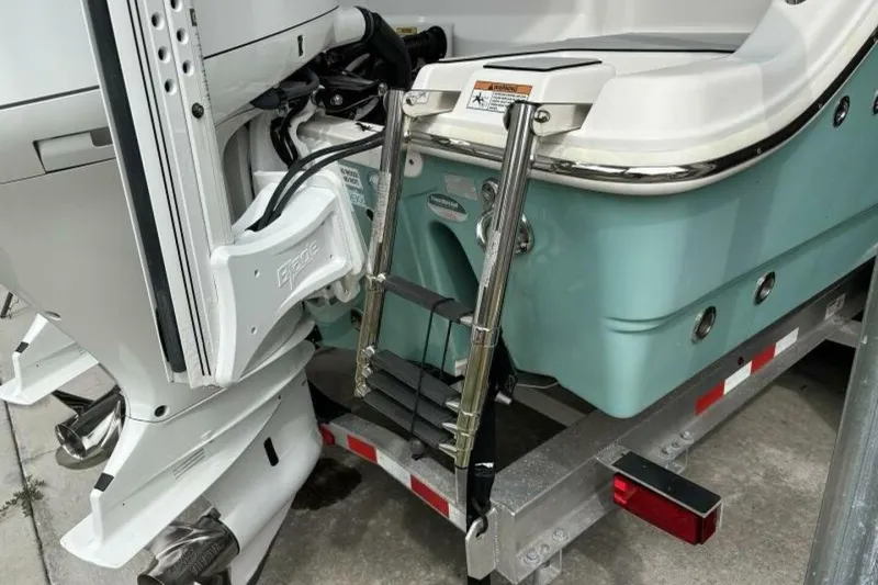 Slide: The Image of 2021 Sea Fox 288 Commander boat with ladder and engine detail. - 22