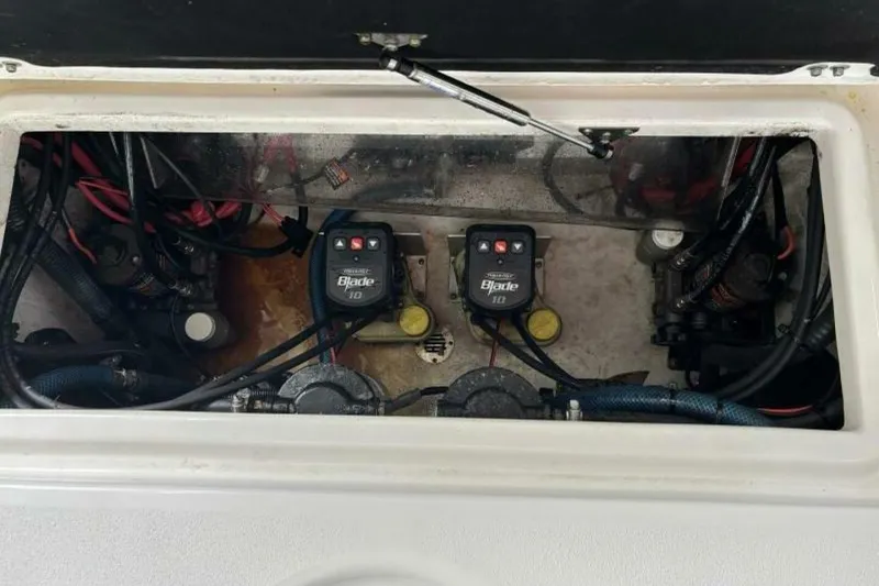 Slide: The Image of 2021 Sea Fox 288 Commander boat electrical compartment with wiring and components. - 25