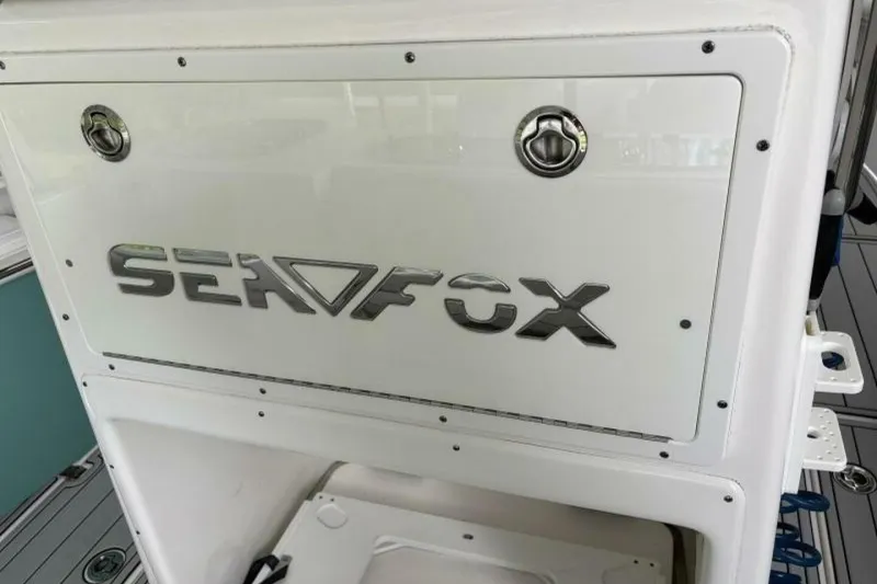 Slide: The Image of 2021 Sea Fox 288 Commander boat console with logo detail. - 50