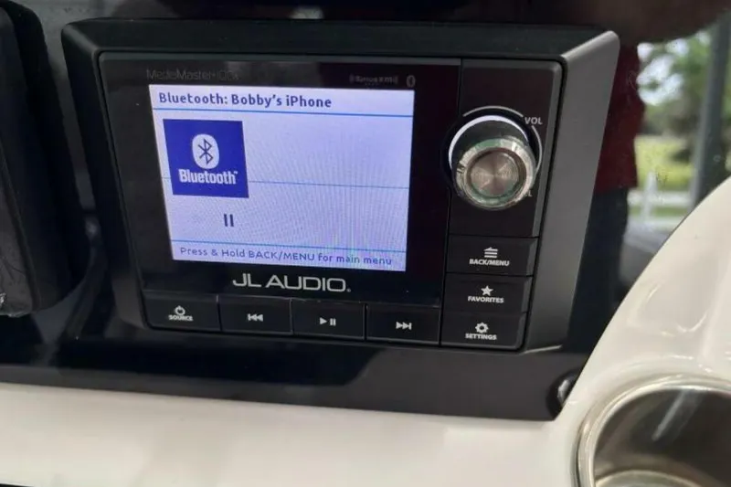 Slide: The Image of JL Audio system on 2021 Sea Fox 288 Commander displaying Bluetooth connection. - 57
