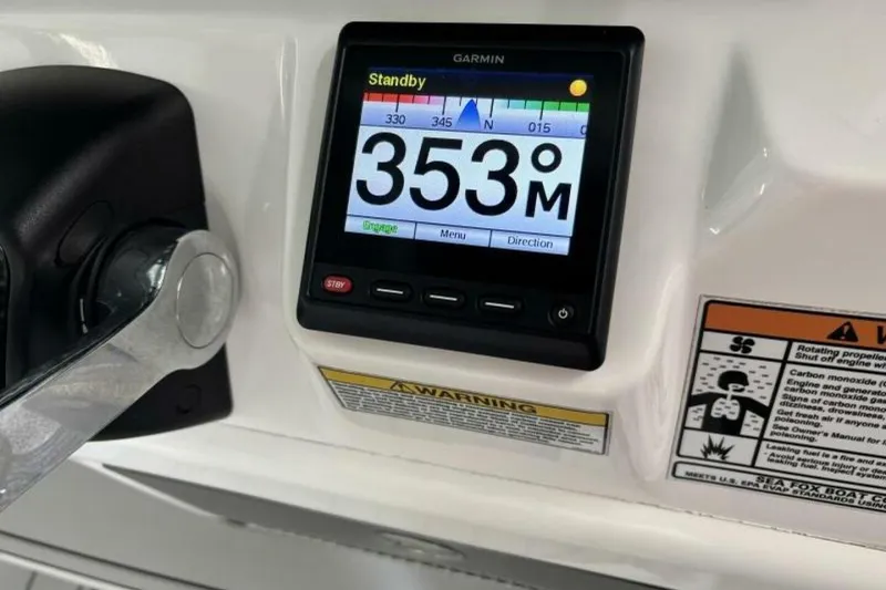 Slide: The Image of Garmin display on 2021 Sea Fox 288 Commander boat dashboard, showing 353 meters. - 58