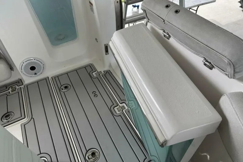 Slide: The Image of 2021 Sea Fox 288 Commander interior with cushioned seating and non-slip flooring. - 61