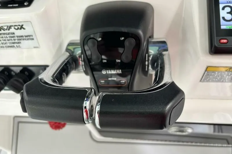 Slide: The Image of Close-up of Yamaha throttle controls on a 2021 Sea Fox 288 Commander boat. - 77