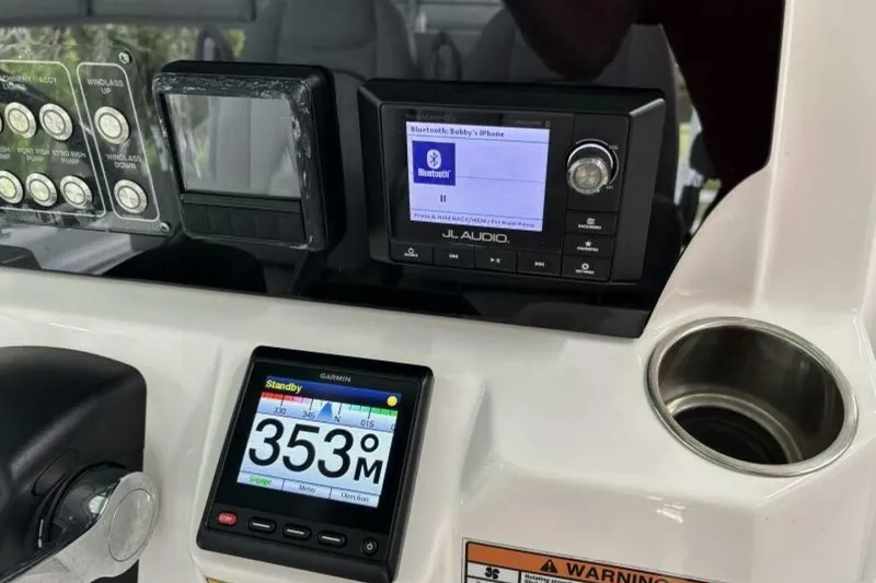 Slide: The Image of Dashboard of 2021 Sea Fox 288 Commander with JL Audio and Garmin displays. - 78