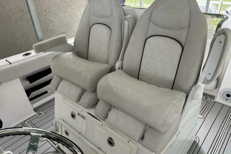 Slide: The Image of 2021 Sea Fox 288 Commander boat interior with plush seating and modern design. - 8