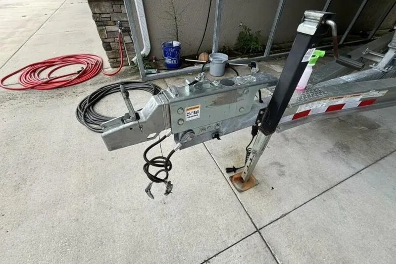 Slide: The Image of Trailer hitch of a 2021 Sea Fox 288 Commander boat on concrete surface. - 85