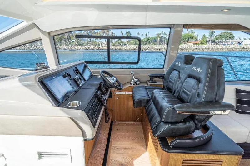 Slide: The Image of Premium leather seating and state of art helm station  with joystick  controls and simrad integration. - 16