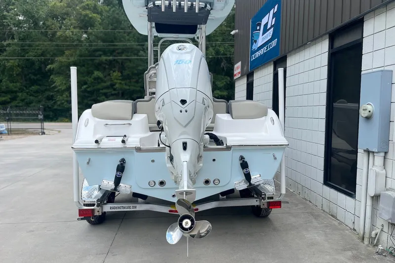 Slide: The Image of 2026 Key West 189 FS boat on trailer, rear view, outside dealership. - 4