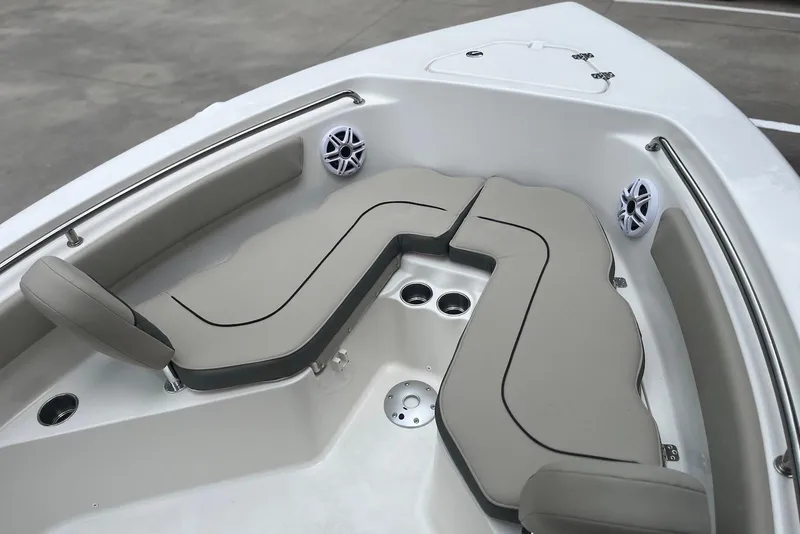 Slide: The Image of 2026 Key West 189 FS boat interior with cushioned seating and built-in speakers. - 5