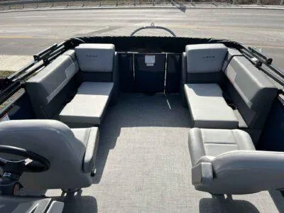 Slide: The Image of Interior of 2025 Lowe LS 230 WT boat with spacious seating arrangement. - 9