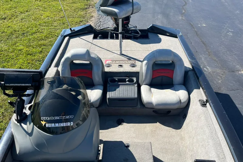 Slide: The Image of 2008 Tracker Pro Team 175 TXW boat interior with seats and Humminbird equipment. - 10