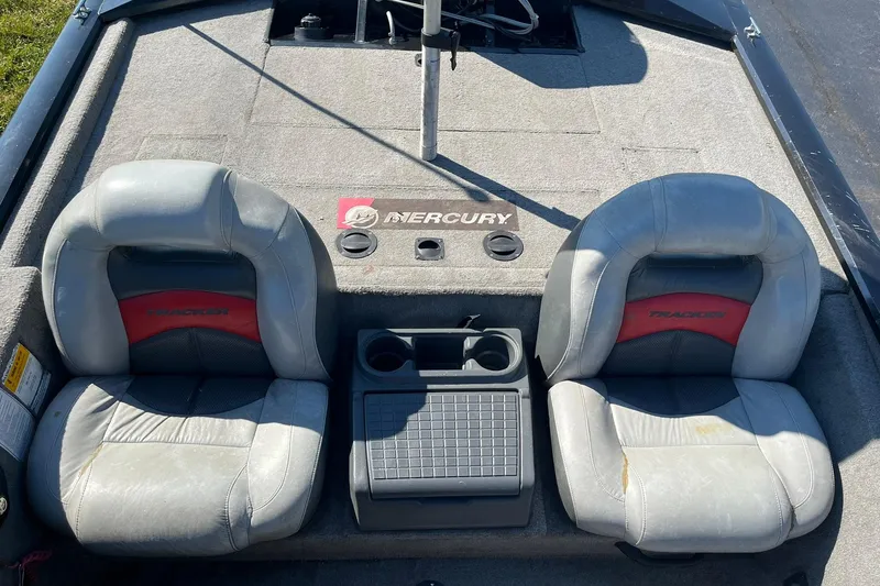 Slide: The Image of 2008 Tracker Pro Team 175 TXW boat interior with dual seats and Mercury branding. - 11