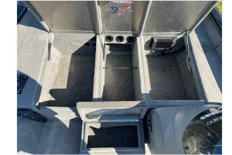 Slide: The Image of 2008 Tracker Pro Team 175 TXW boat interior storage compartments. - 14