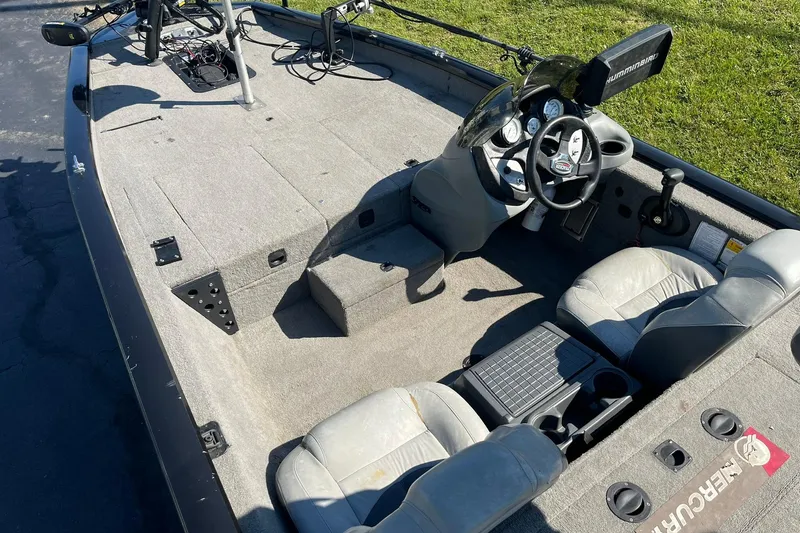 Slide: The Image of 2008 Tracker Pro Team 175 TXW boat interior with steering console and seating. - 7