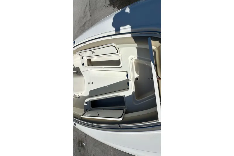 Slide: The Image of 2012 Blackwood 270 boat interior with open storage compartments. - 11